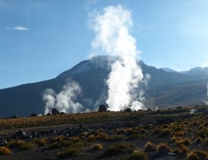 volcano with smokes surrounded thumbnail