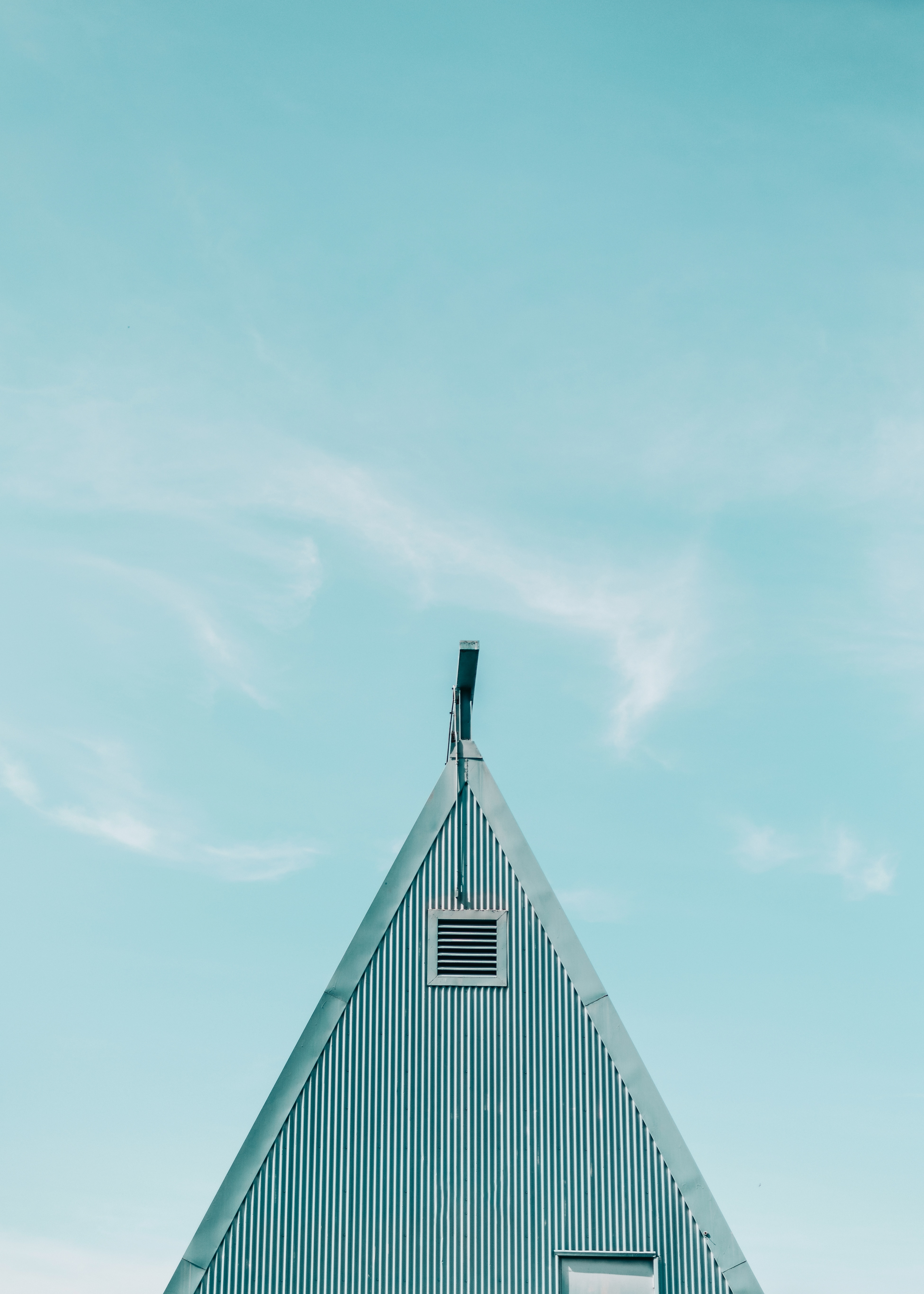 photography of triangular roofing of a house