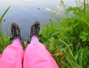 pink pants and black lace up shoes thumbnail