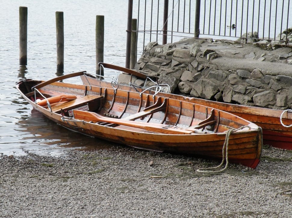brown wooden row boat preview