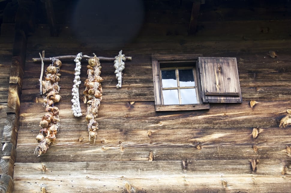 garlic strands and brown wood window preview