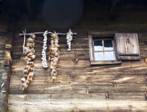 garlic strands and brown wood window thumbnail