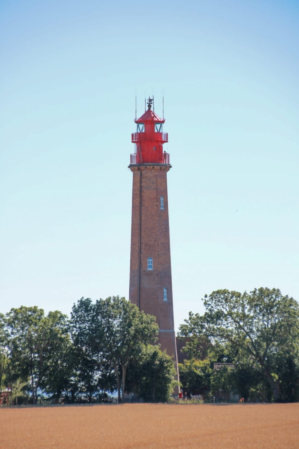 red and brown lighthouse preview