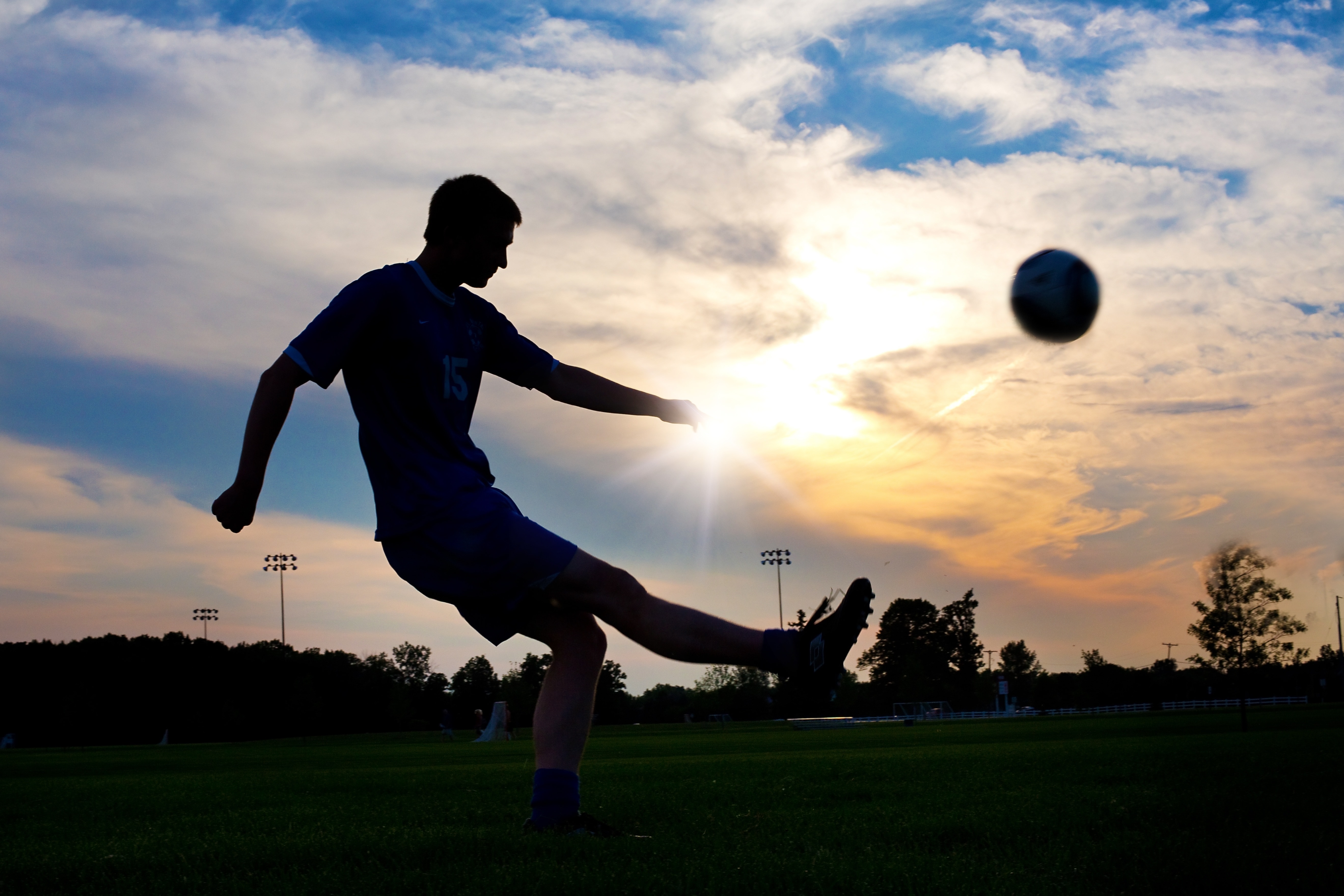 silhouette of soccer player and ball free image | Peakpx