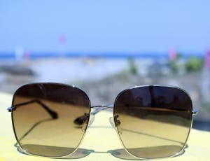 silver framed yellow lens sunglasses thumbnail