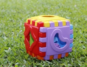 children's red yellow purple blue and orange cube puzzle thumbnail