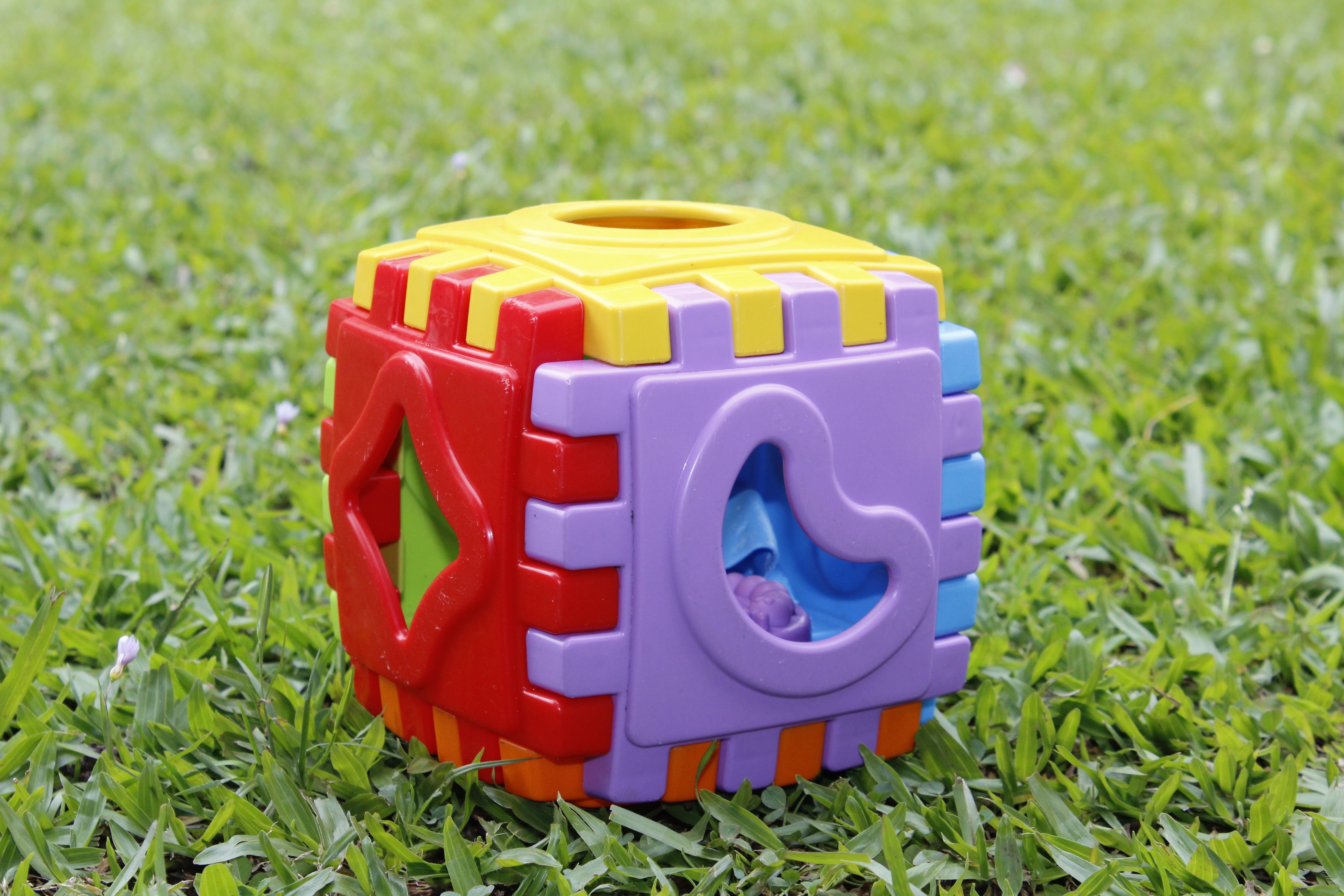 children's red yellow purple blue and orange cube puzzle