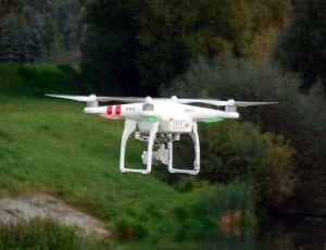 white quadcopter drone thumbnail