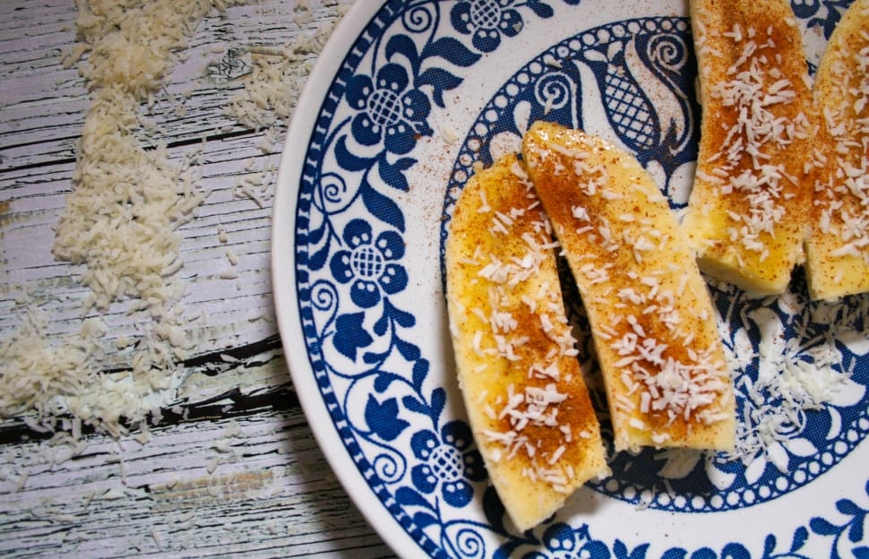 rice on toppings on pastry on top of wooden slab preview