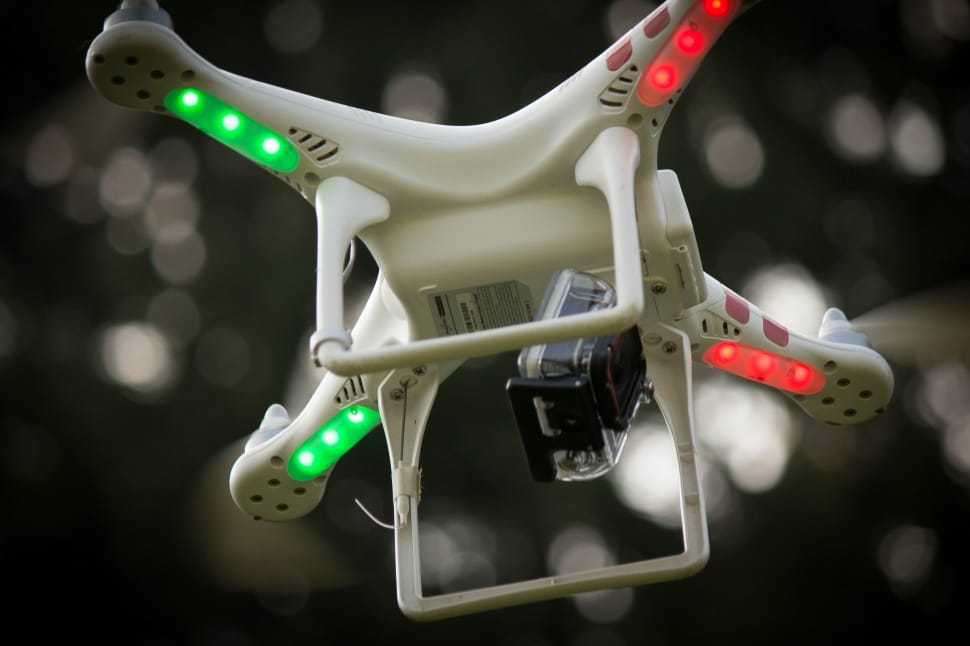 white and red quadcopter drone camera preview