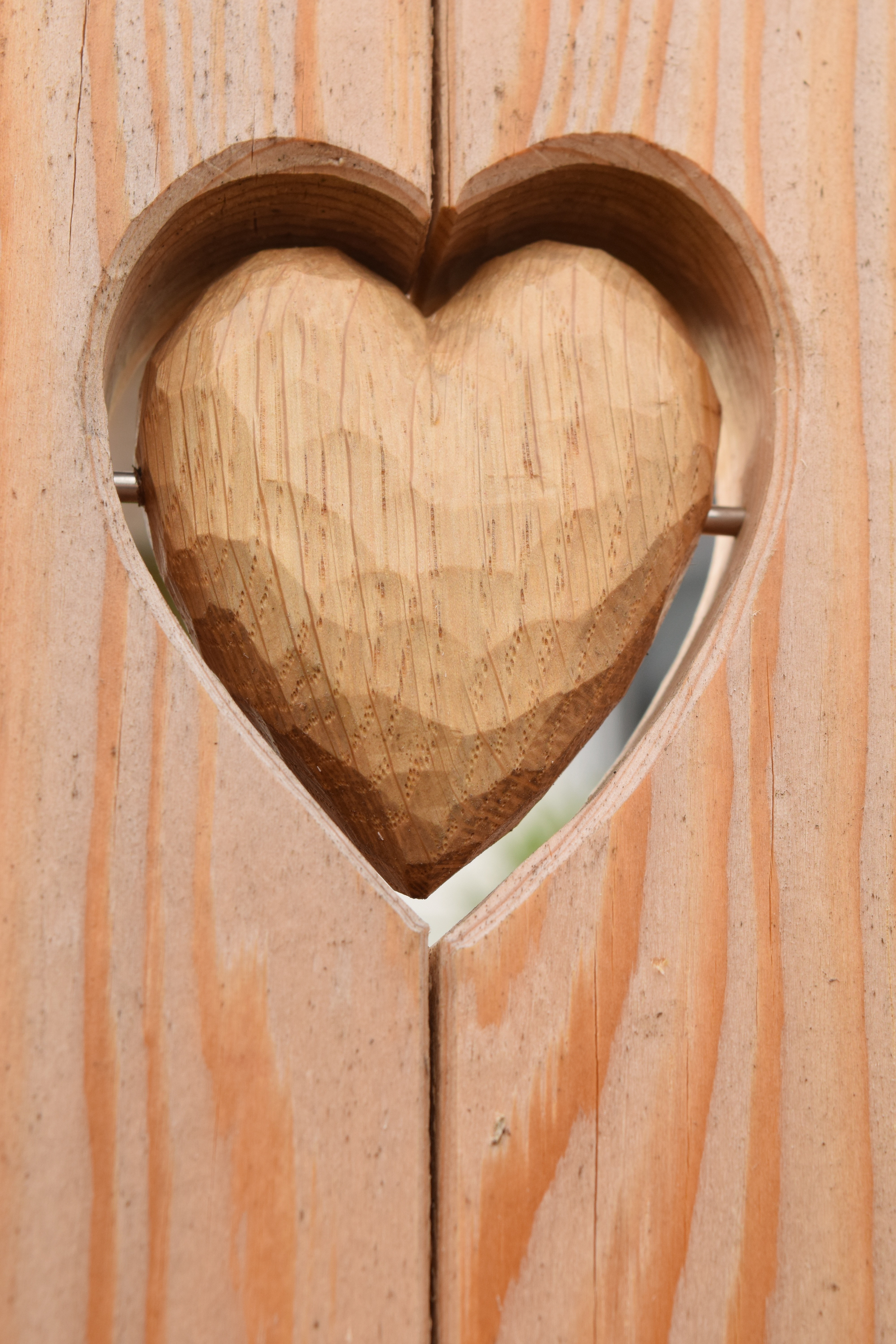 brown wooden heart carving