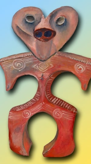 red wooden man shape figure thumbnail