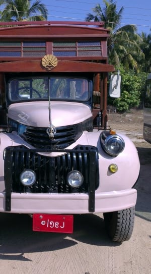 pink and brown classic vehicle thumbnail