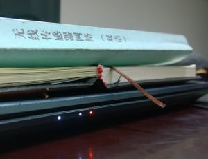 kanji text book on black laptop thumbnail