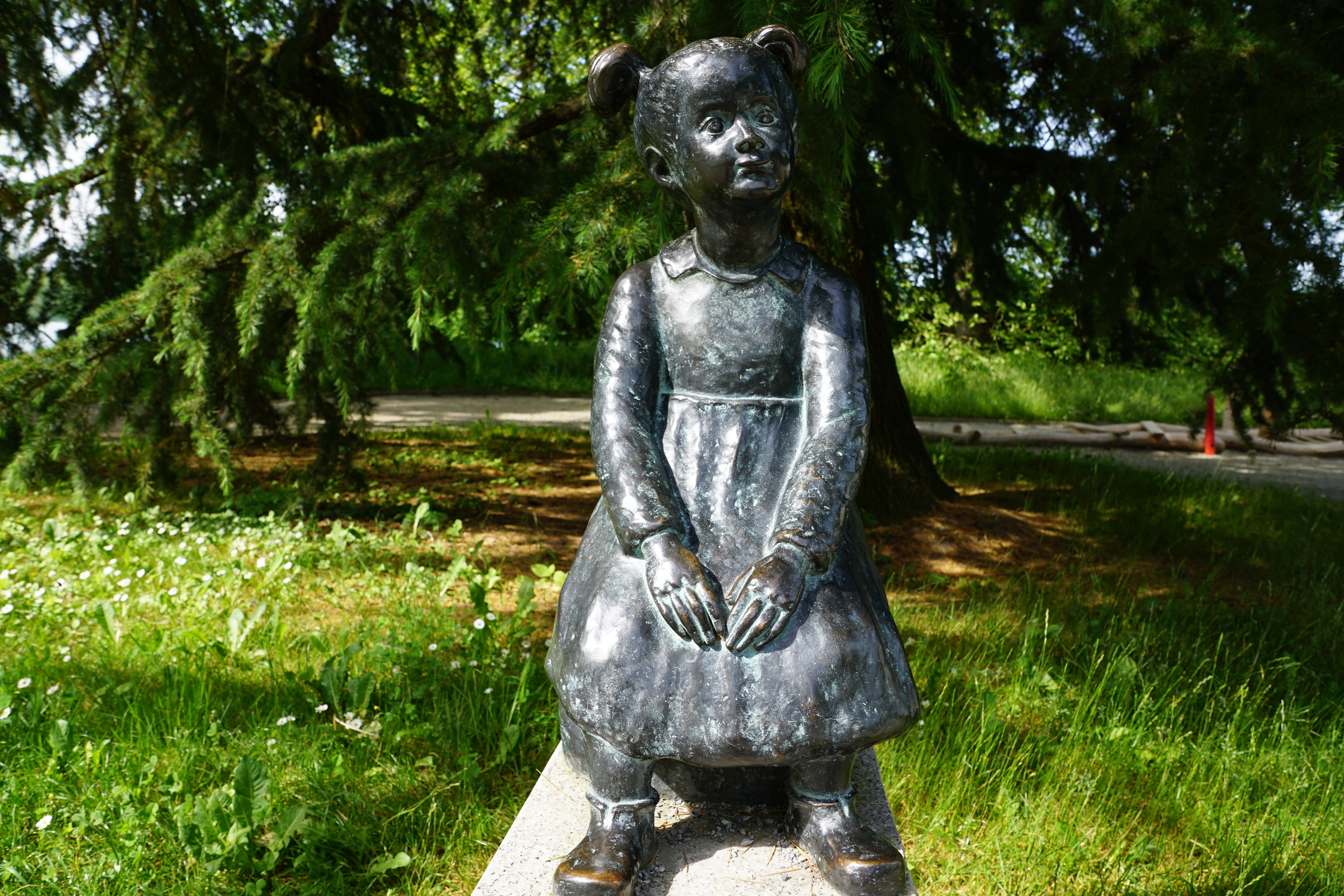 girl sitting statue