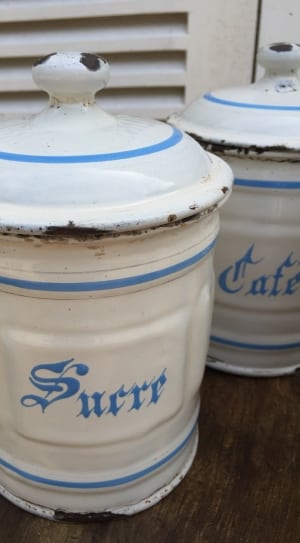 white and blue surr metal canister thumbnail