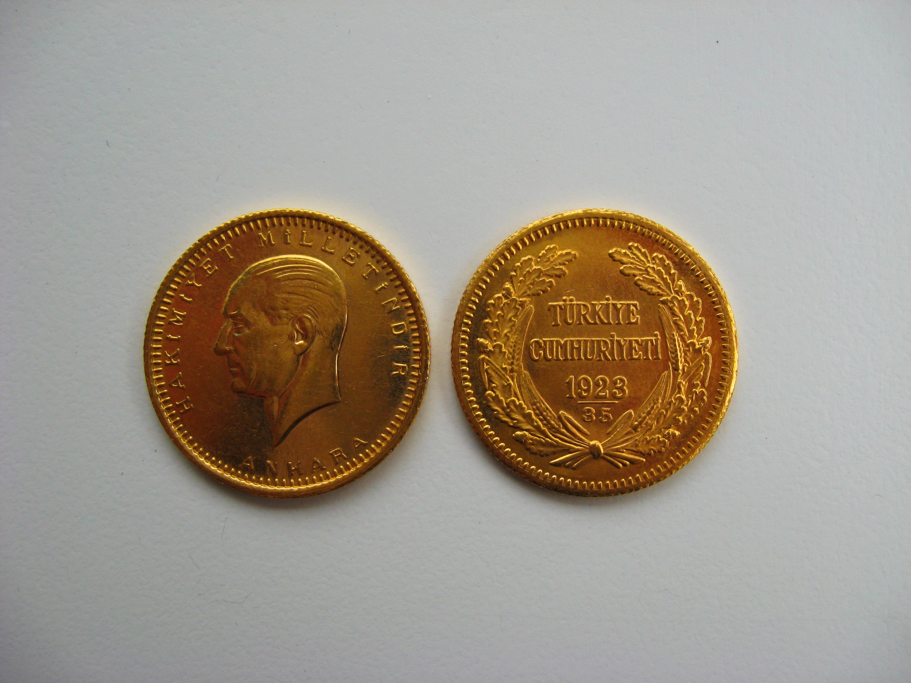 2 gold round coins