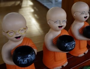 ceramic monks figurine thumbnail