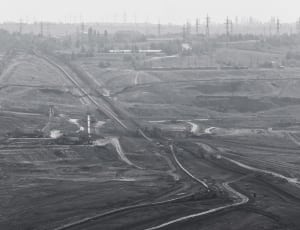 grayscale photograph of industrial lands thumbnail