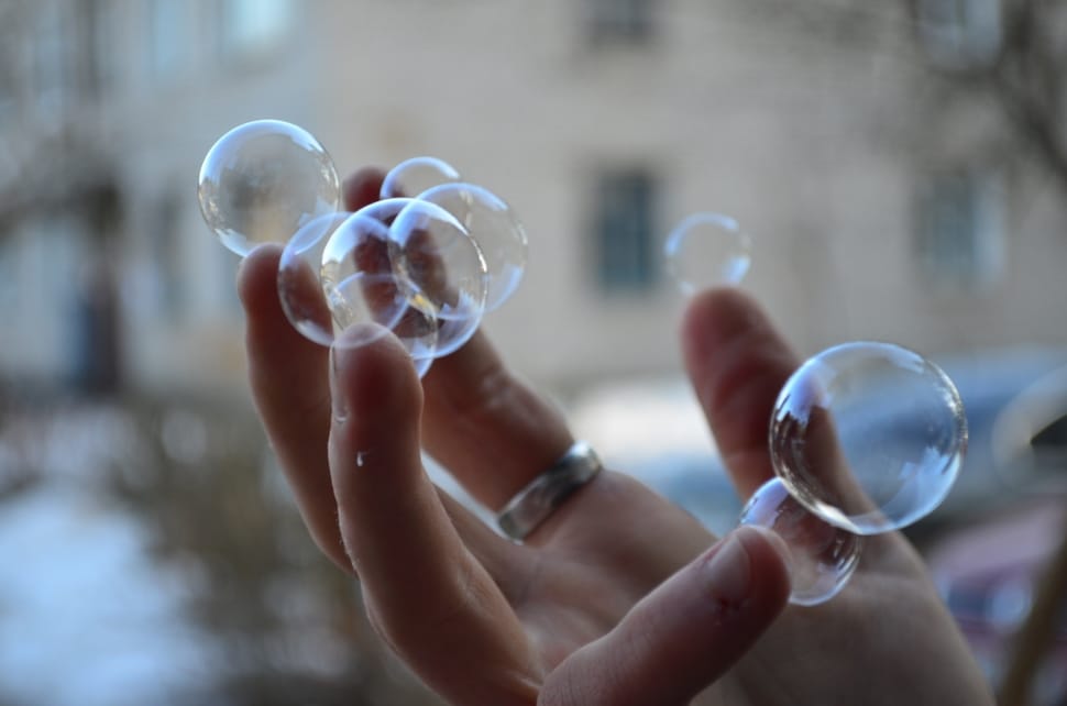 bubbles near human fingers preview