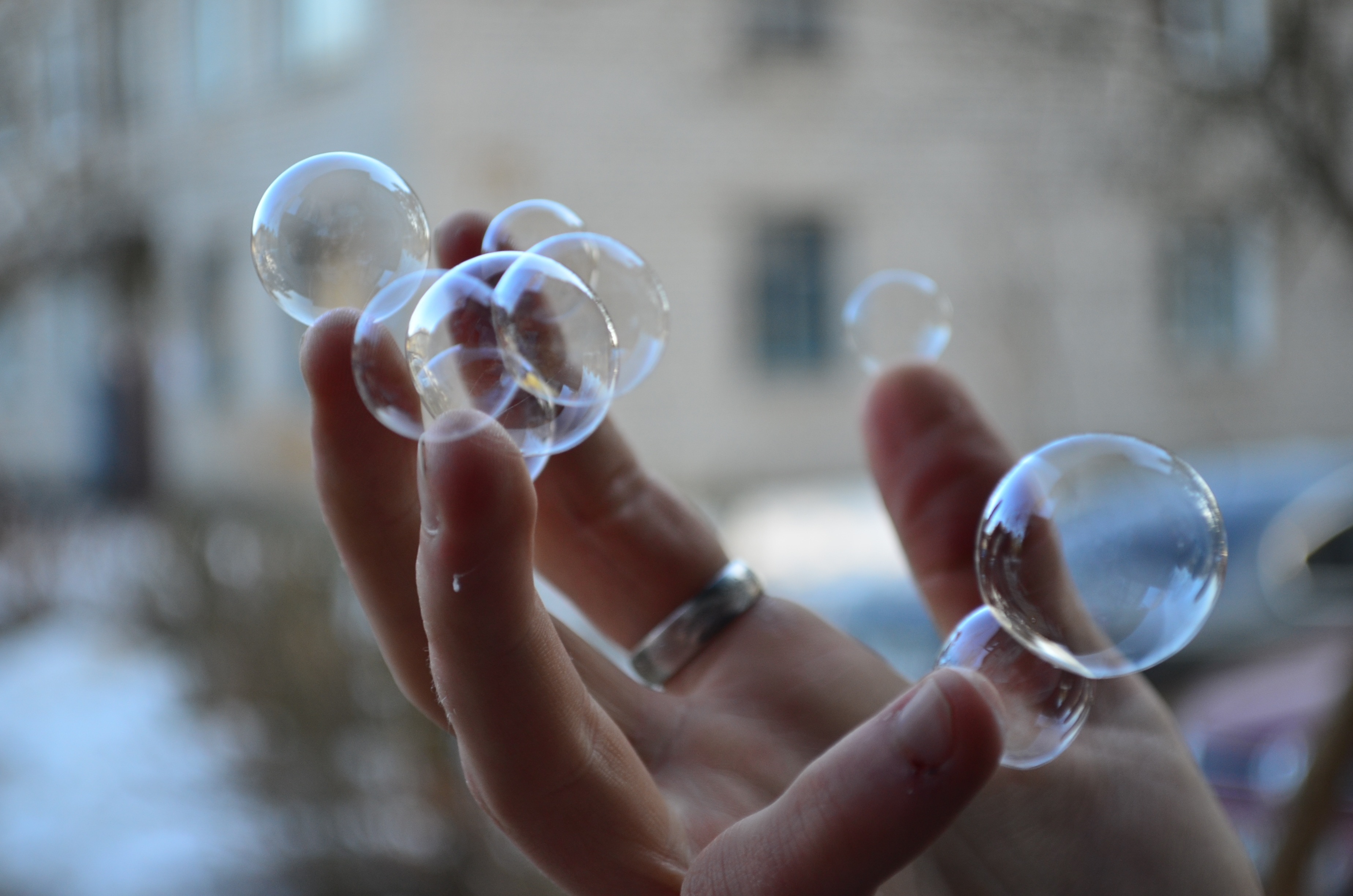 bubbles near human fingers