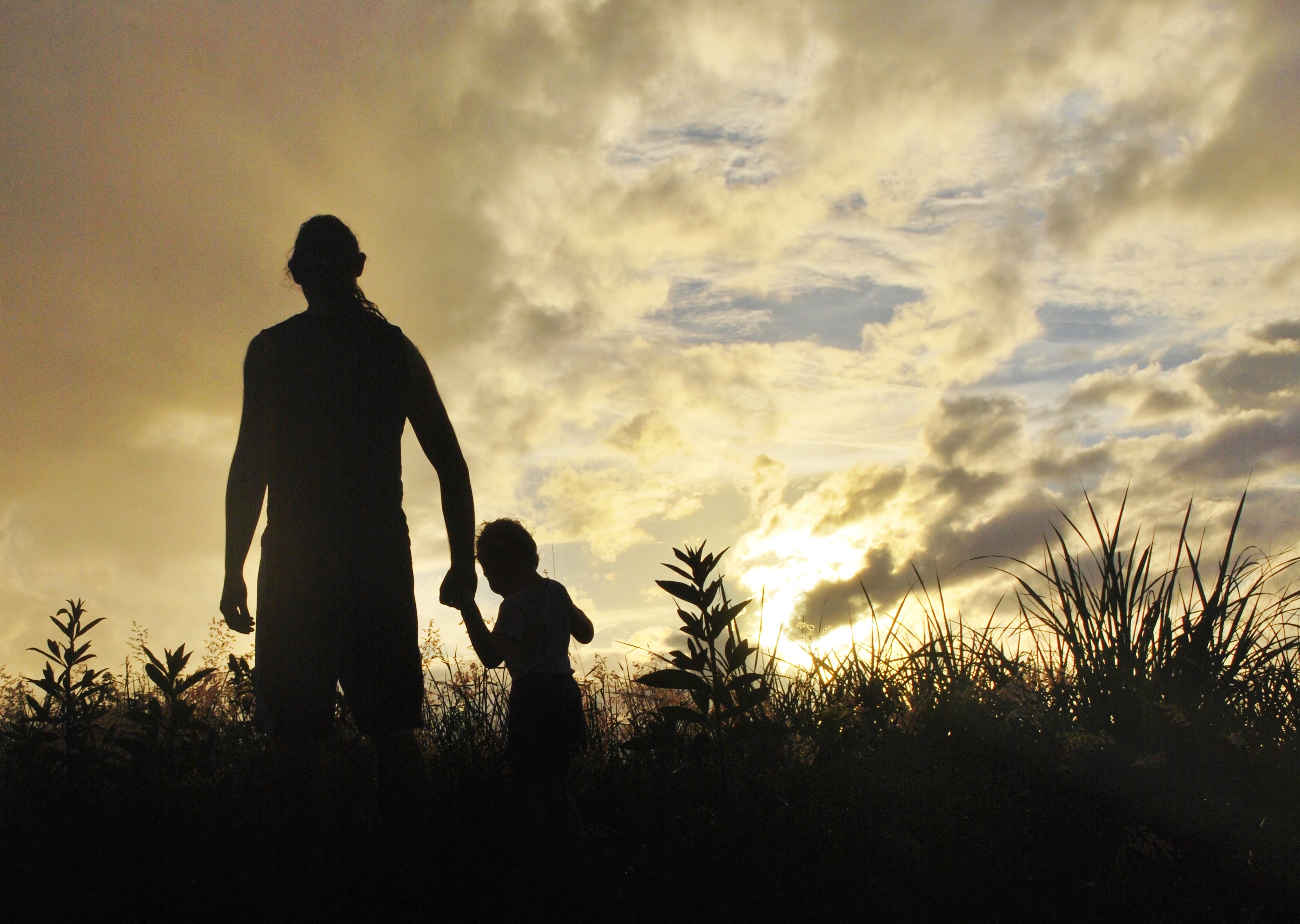 adult and child silhouette