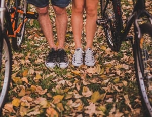 two person showing sneakers thumbnail