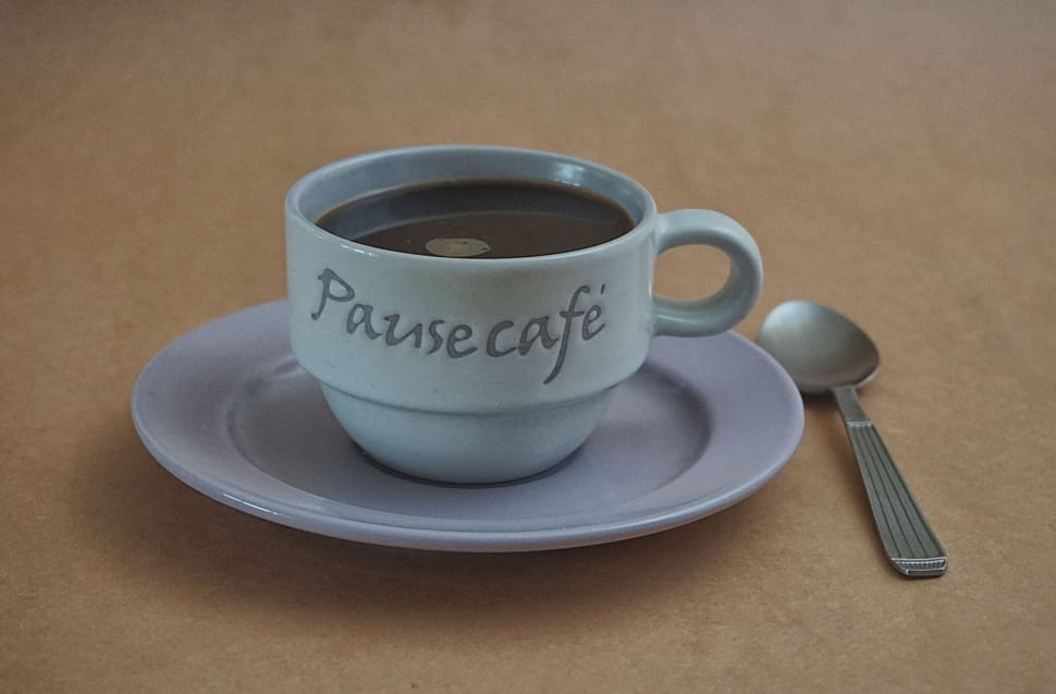 pause cage white ceramic teacup and spoon with saucer preview