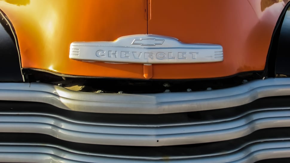 orange chevrolet car preview