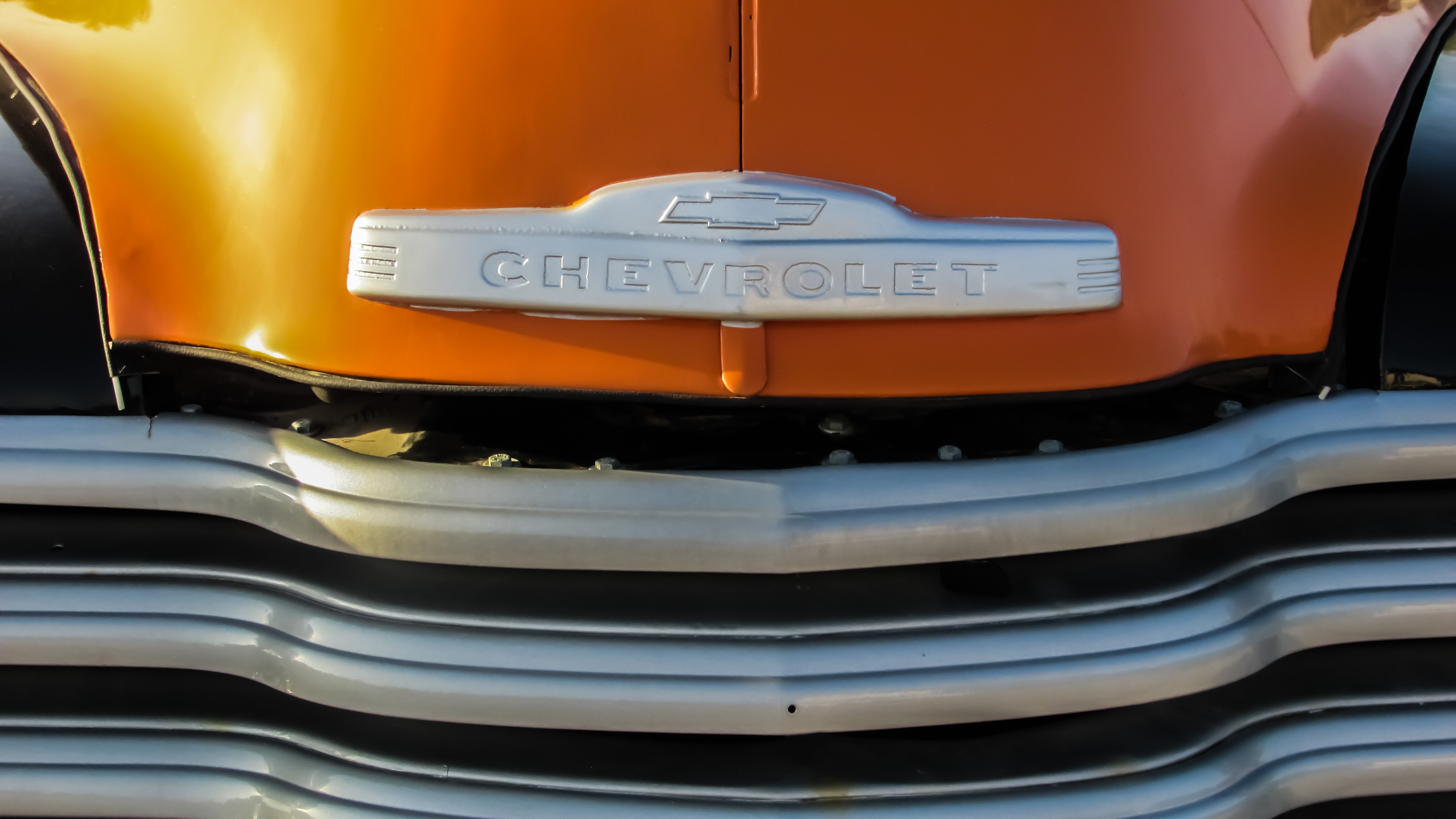 orange chevrolet car