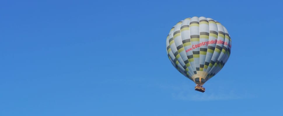 green white and yellow hot air balloon preview