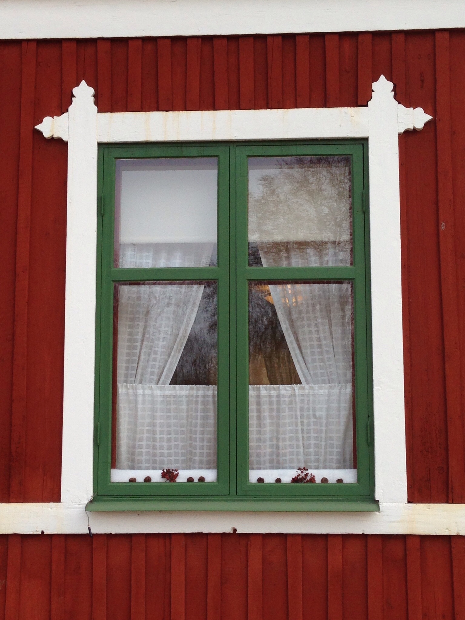 green wooden frame glass window