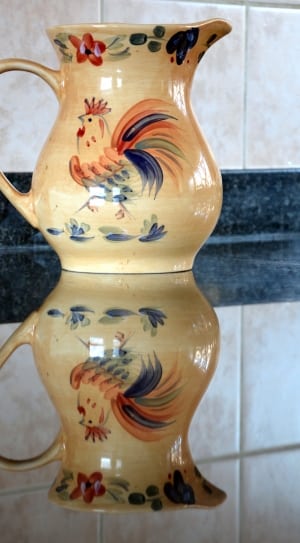 yelloe rooster print ceramic pitcher thumbnail