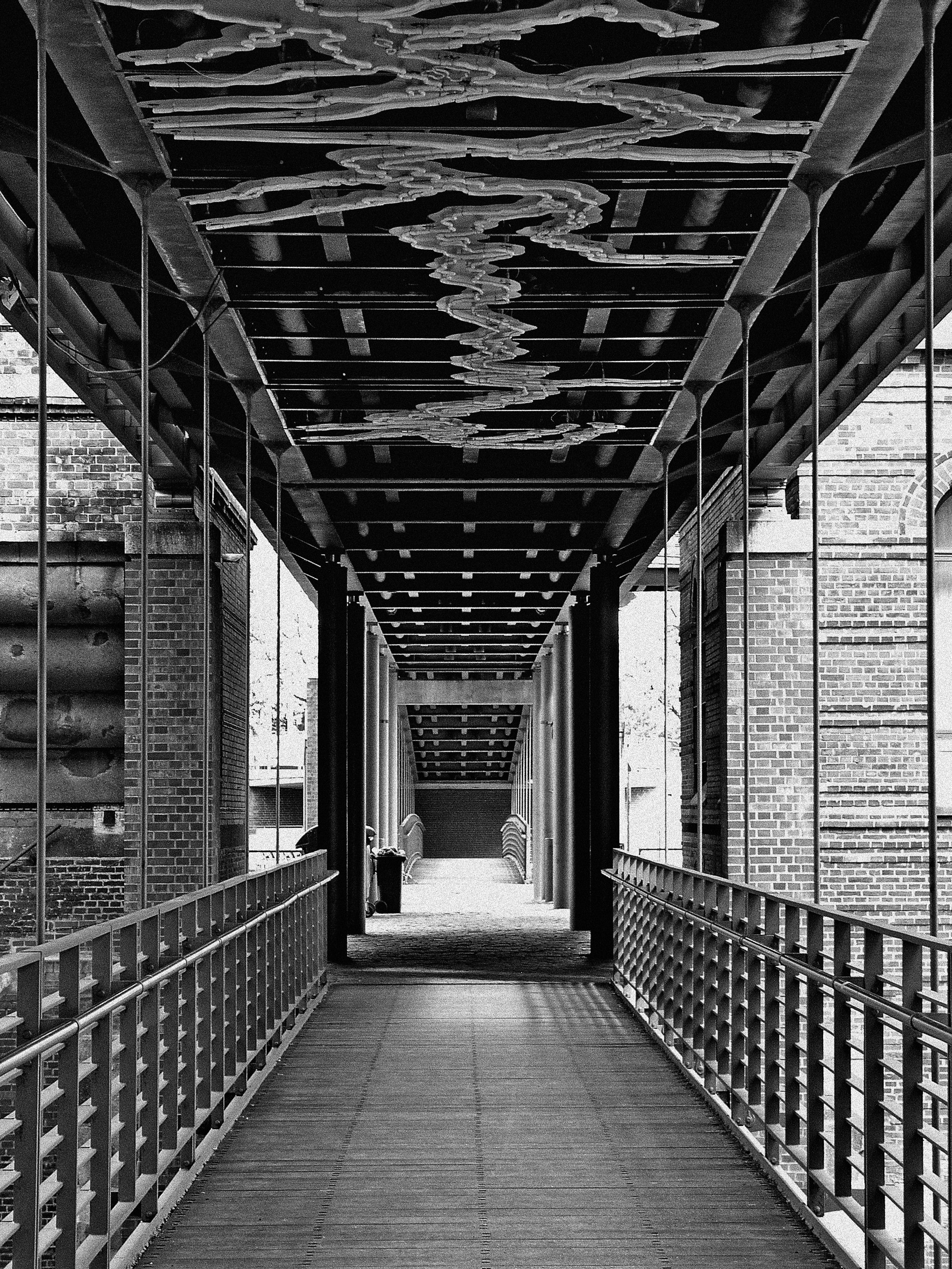grayscale photo  of hallway