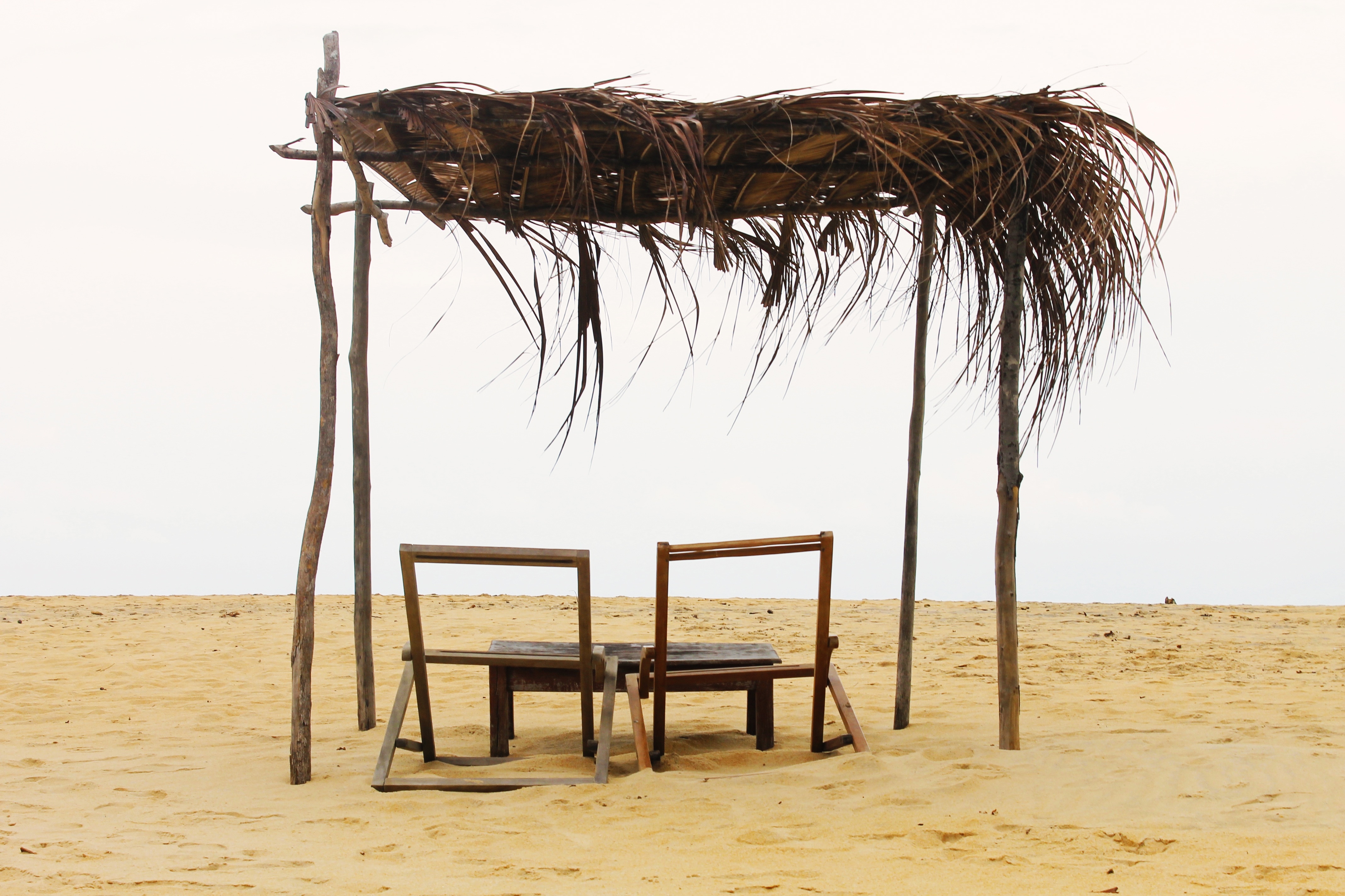 brown wooden beach chairs