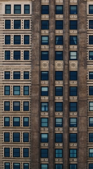 beige and brown residential building thumbnail