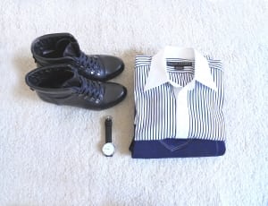black and white pinstripe dress shirt, analog watch and black patent leather boots thumbnail