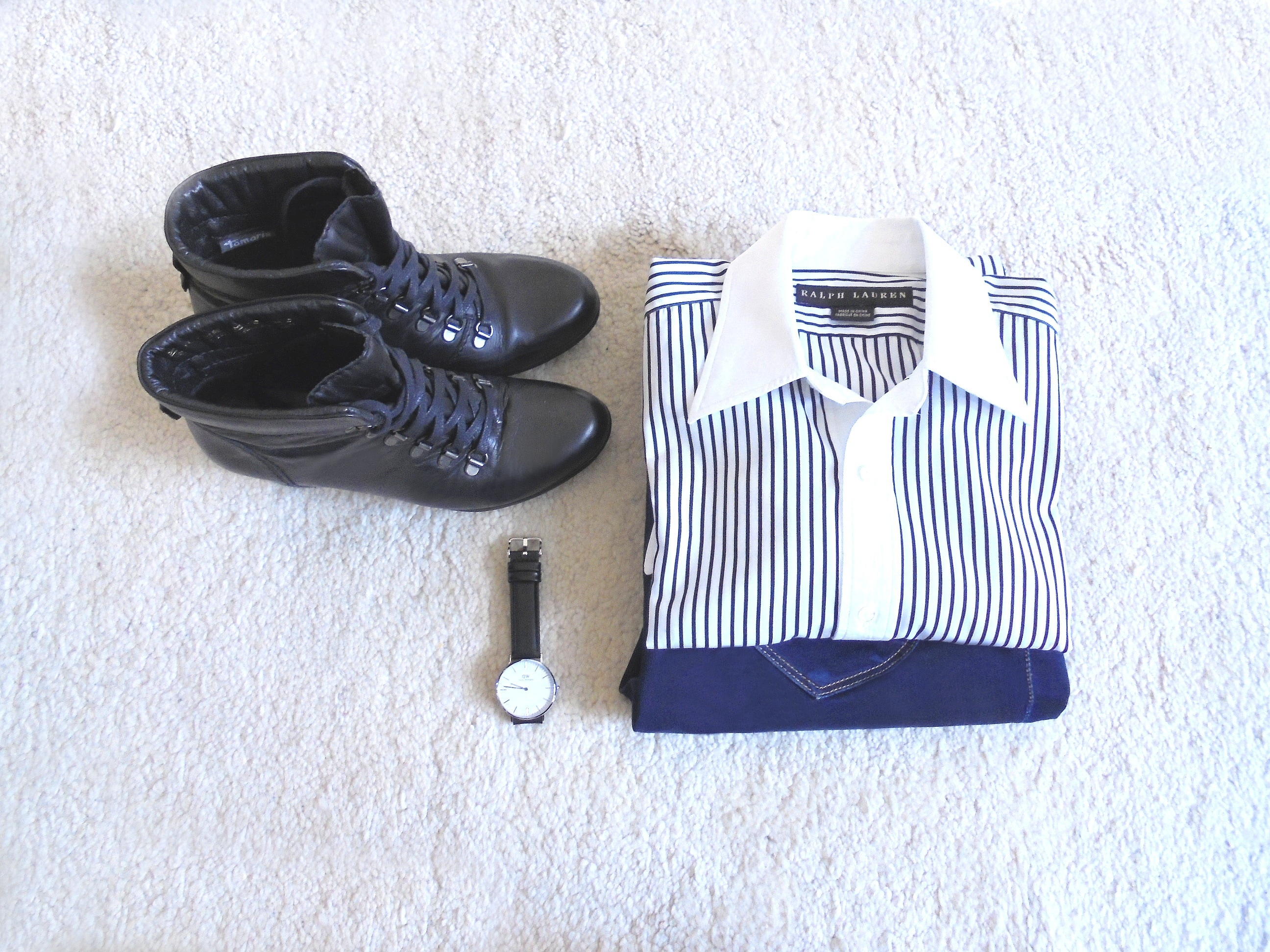 black and white pinstripe dress shirt, analog watch and black patent leather boots