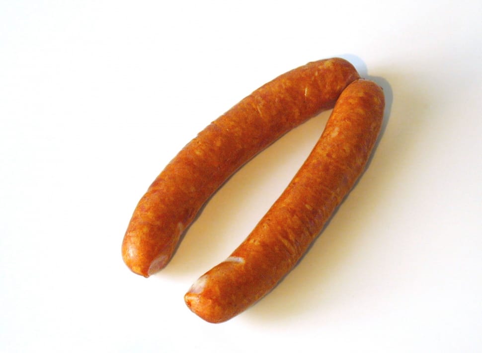 two sausage on white surface preview
