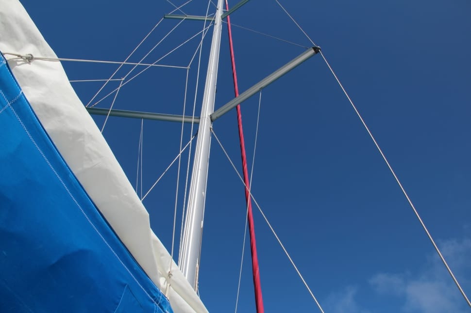 white and blue sailboat preview