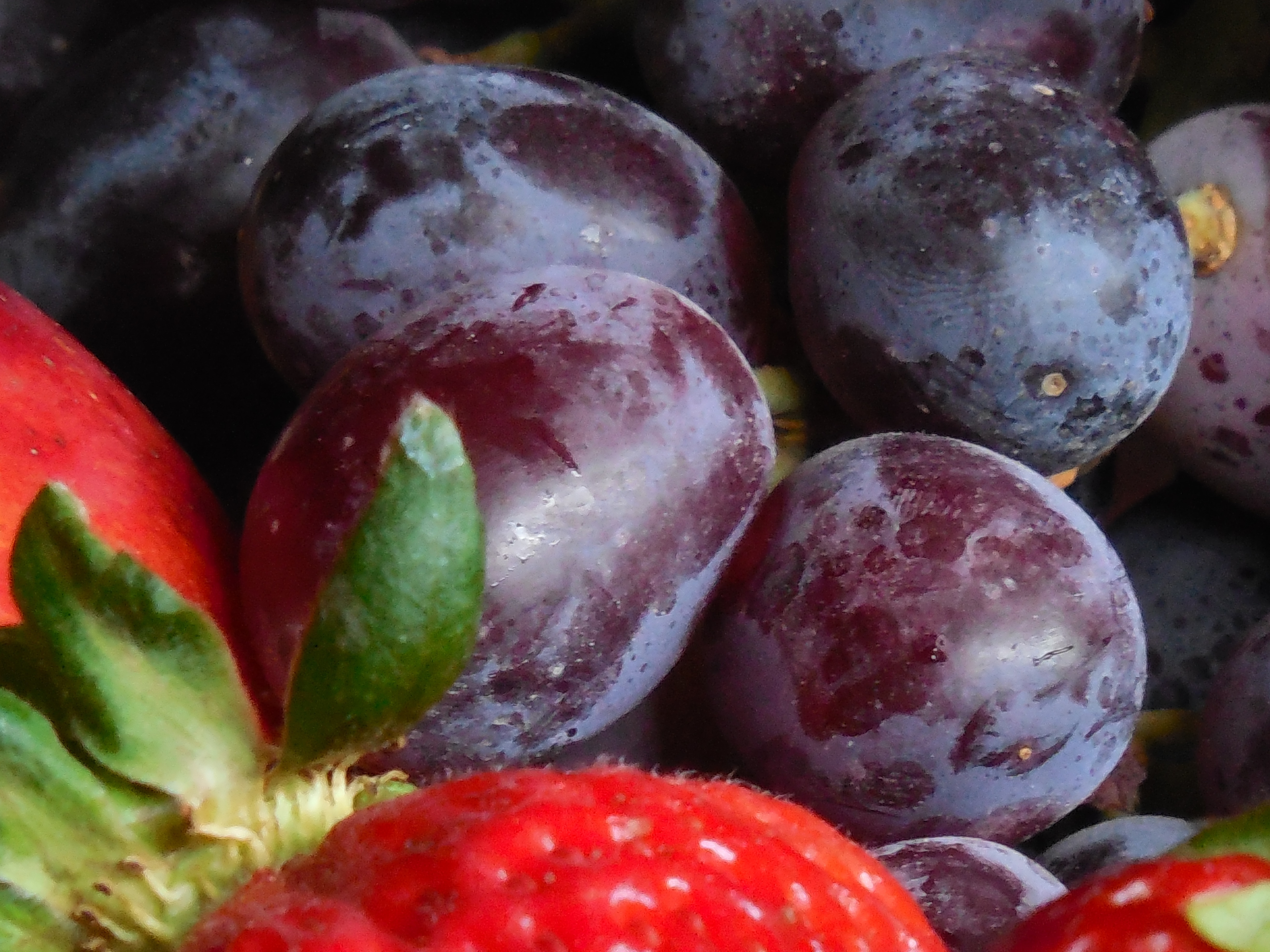 purple grapes and red strawberry