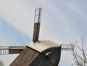 brown wooden windmill thumbnail