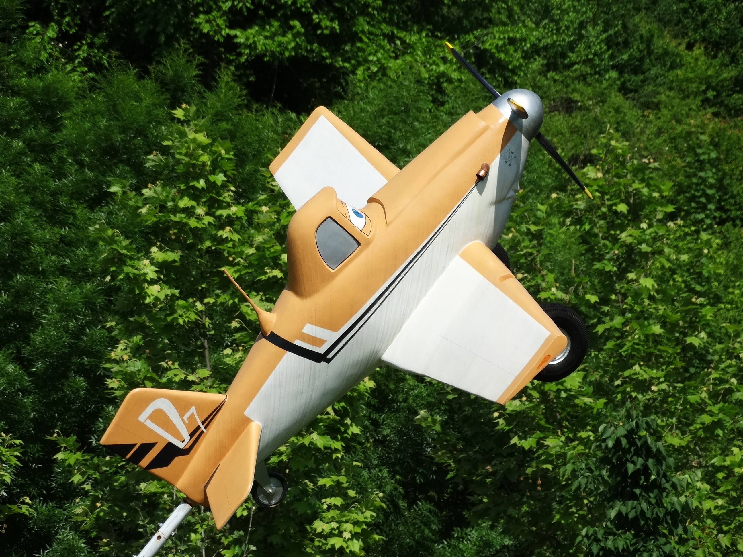 white and brown rc biplane toy