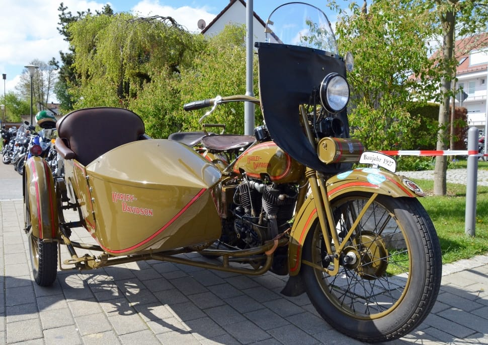brown standard motorcycle with cab preview
