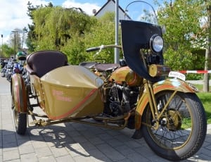 brown standard motorcycle with cab thumbnail