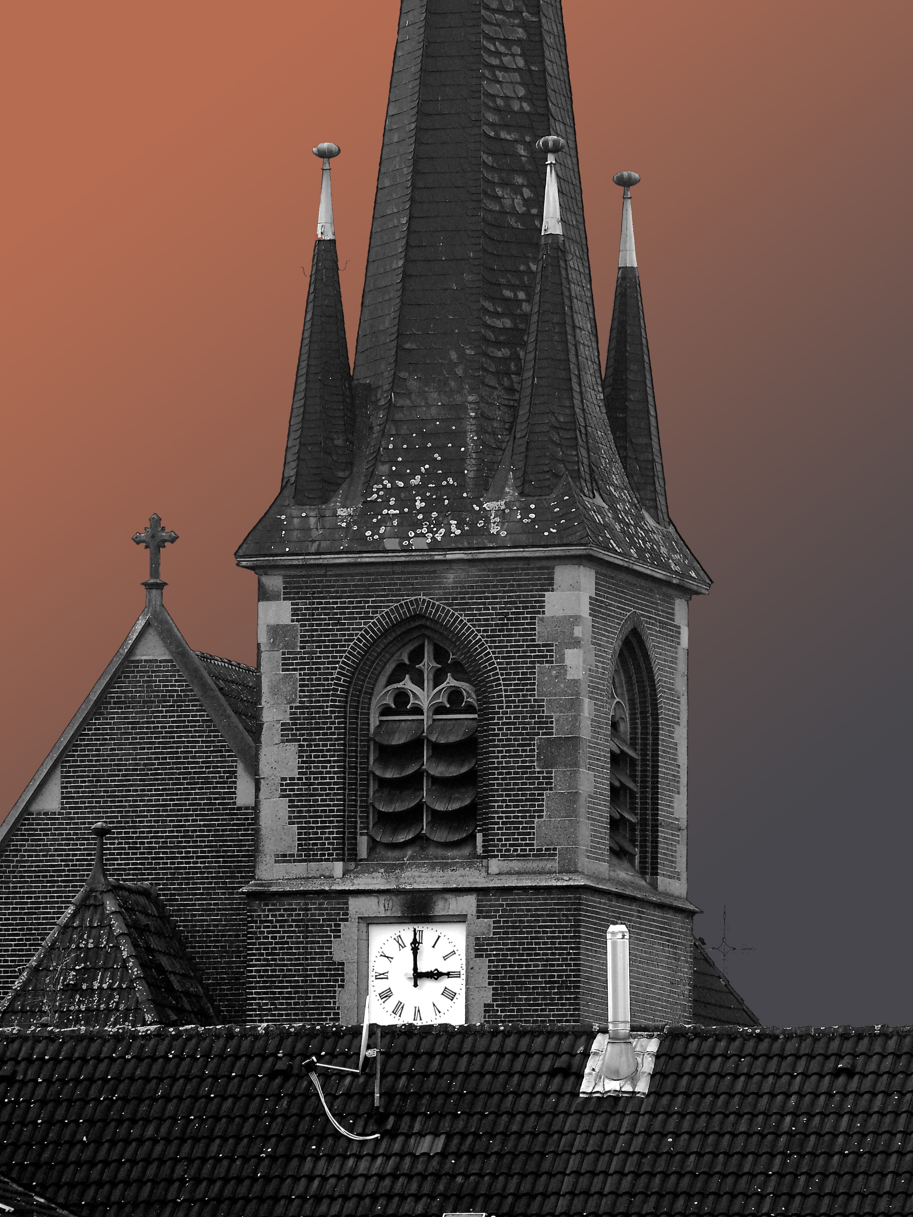 grey and black cathedral with analog clock