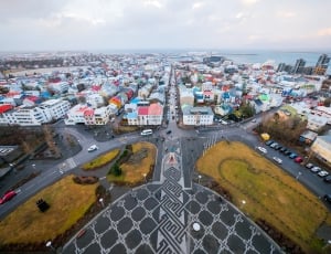 aerial view of grey road and city thumbnail
