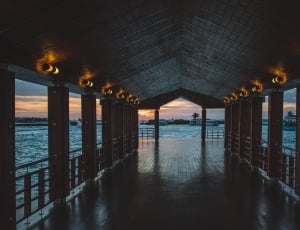 brown wooden lighted hallway thumbnail