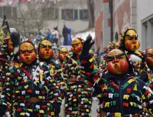 parade of people wearing mask thumbnail