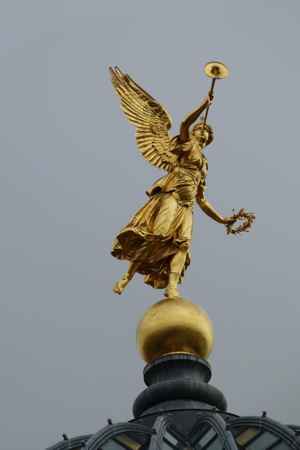 low angle photo of a gold Angel Statue preview